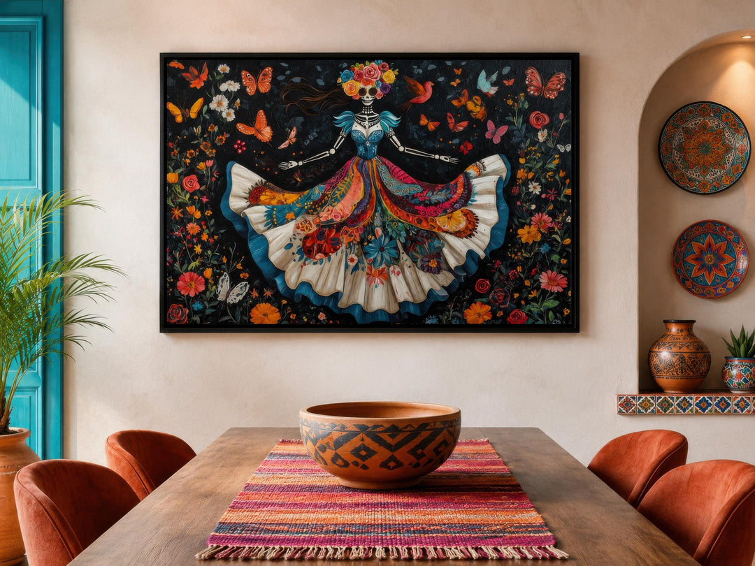 Day of the Dead wall art featuring a dancing Catrina canvas with a vibrant floral skull painting.