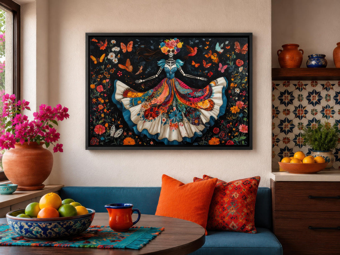 Framed canvas wall art of a dancing Catrina in a vibrant floral dress for Day of the Dead decor.