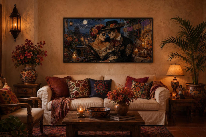 Day of the Dead wall art featuring a romantic sugar skull couple canvas above a living room sofa.