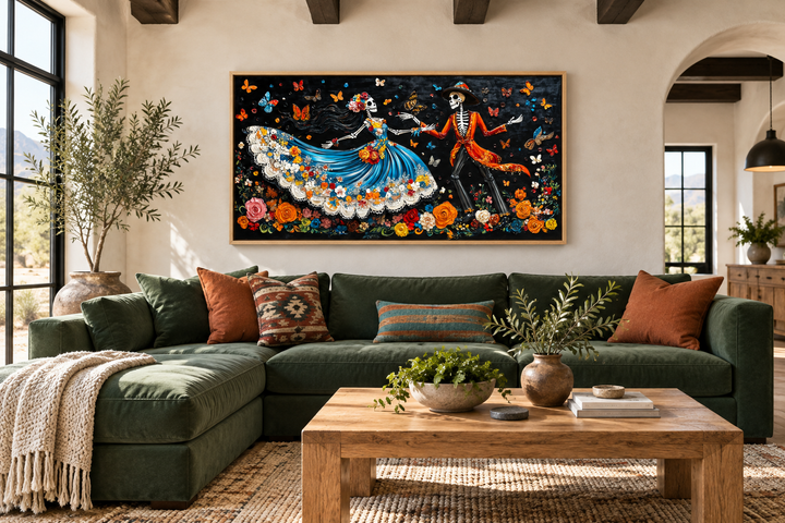 Day of the Dead dancing skeletons canvas wall art above a green sofa in a rustic living room.