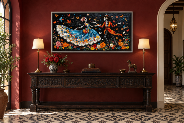 Day of the Dead dancing skeletons canvas wall art above a carved wooden console table.