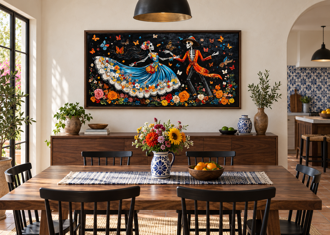 Day of the Dead dancing skeletons canvas wall art hanging above a wooden sideboard in a dining room.