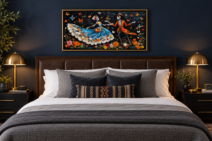 Day of the Dead dancing skeletons canvas wall art above a bed in a dark blue bedroom.