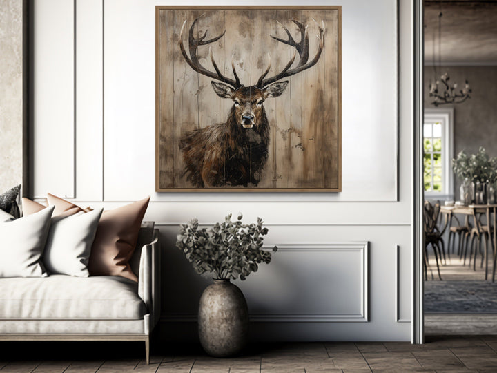 Deer portrait on distressed wood rustic framed canvas wall art in a modern living room setting.