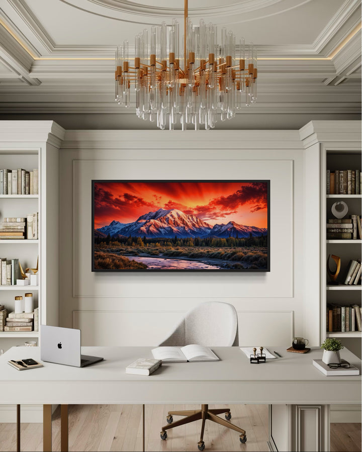 Framed Denali National Park sunset canvas wall art above a desk in a modern home office.