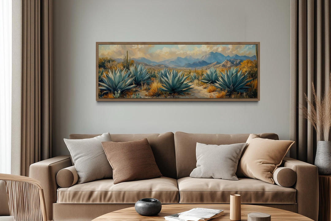 Desert agave long horizontal southwestern wall decor above a brown sofa in a modern living room.