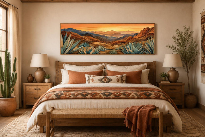 Desert Agave Wall Art canvas print with terracotta and teal landscape above a southwestern bed.