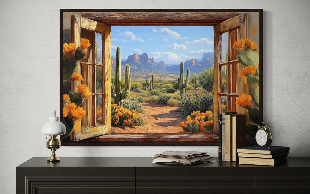 Desert cactus window view canvas wall art showing a Southwestern landscape with mountains.