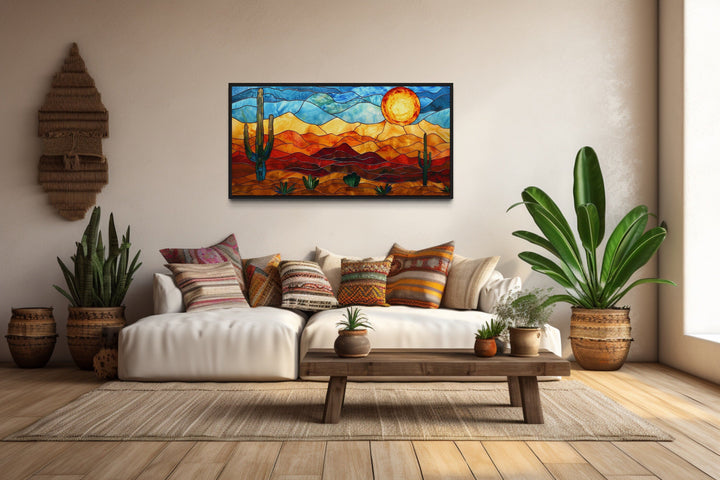 Framed canvas wall art with a desert landscape in stained glass style.