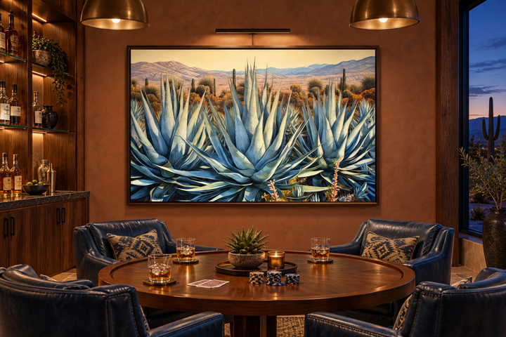 Desert Agave Mexican Framed Canvas Wall Art above a round table in a rustic lounge setting.
