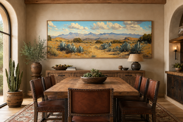 Agave in the Desert long horizontal framed canvas wall art above a rustic wooden dining table.