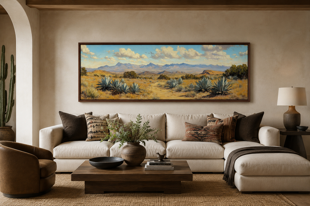 Agave in the Desert long horizontal framed canvas wall art above a white sectional sofa.
