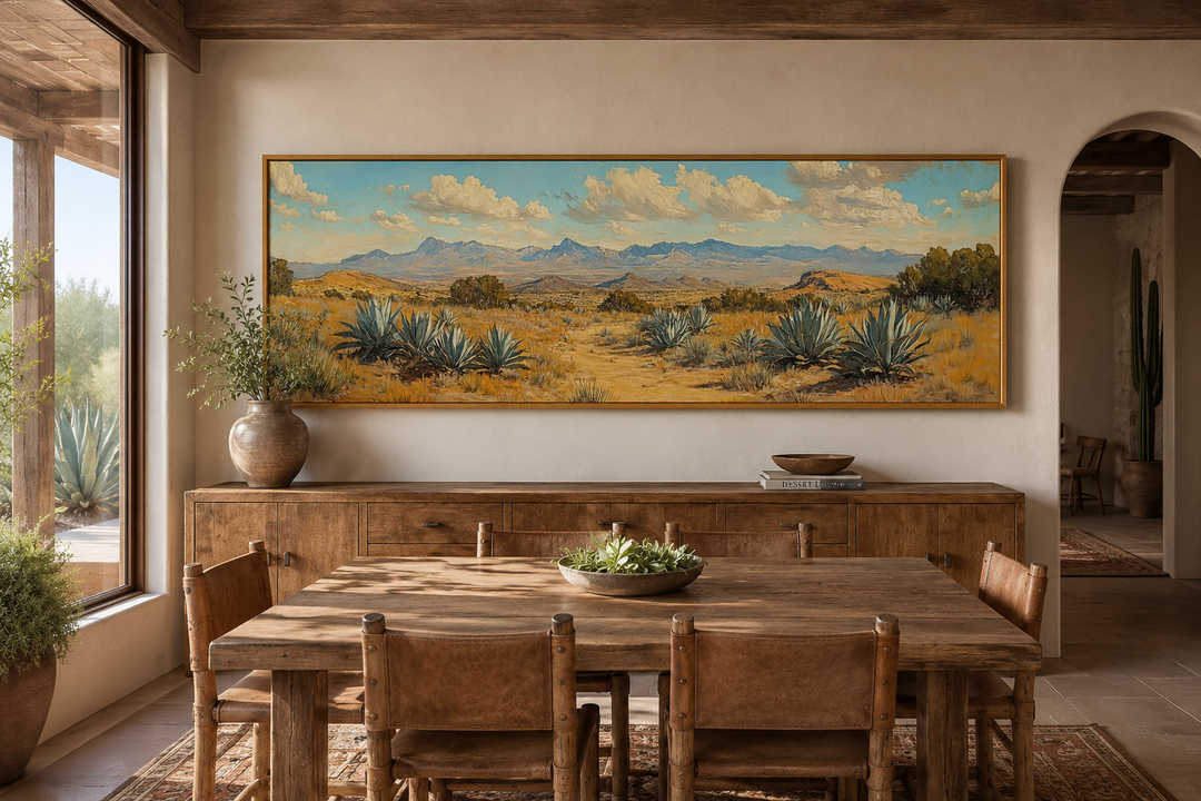 Agave in the Desert long horizontal framed canvas wall art above a rustic wooden dining table.