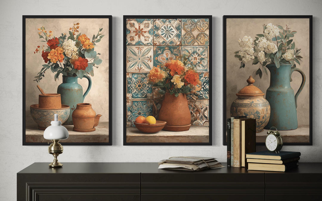 Set of 3 rustic canvas prints featuring floral arrangements in pottery on a dark wood sideboard.