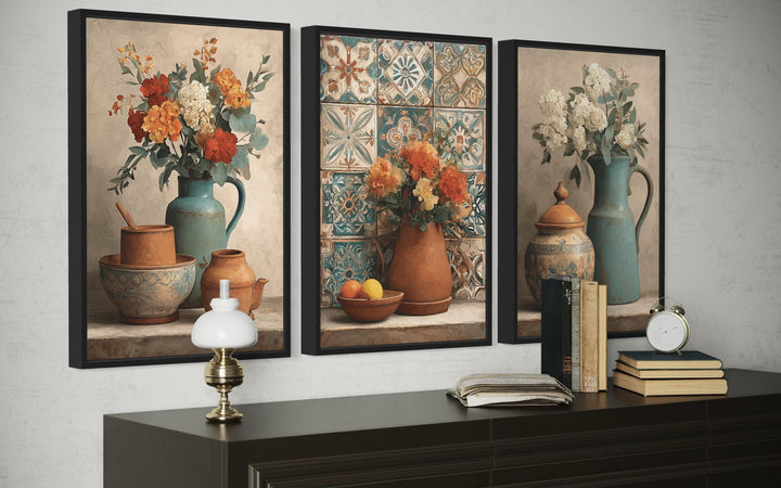 Set of 3 rustic canvas wall art prints featuring floral pottery and vases in warm, earthy tones.