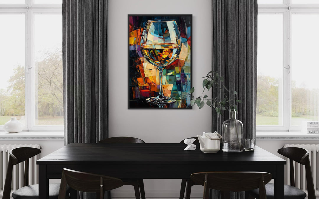 Abstract wine glass canvas print in vibrant jewel tones hanging in a modern dining room.