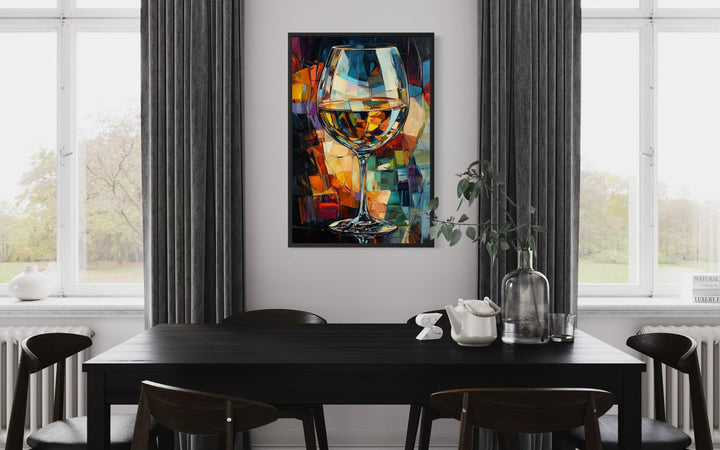 Abstract wine glass canvas print in vibrant jewel tones hanging in a modern dining room.