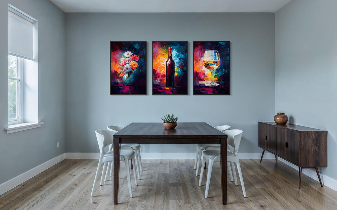 Set of three colorful canvas prints featuring a wine bottle, flower vase, and wine glass.
