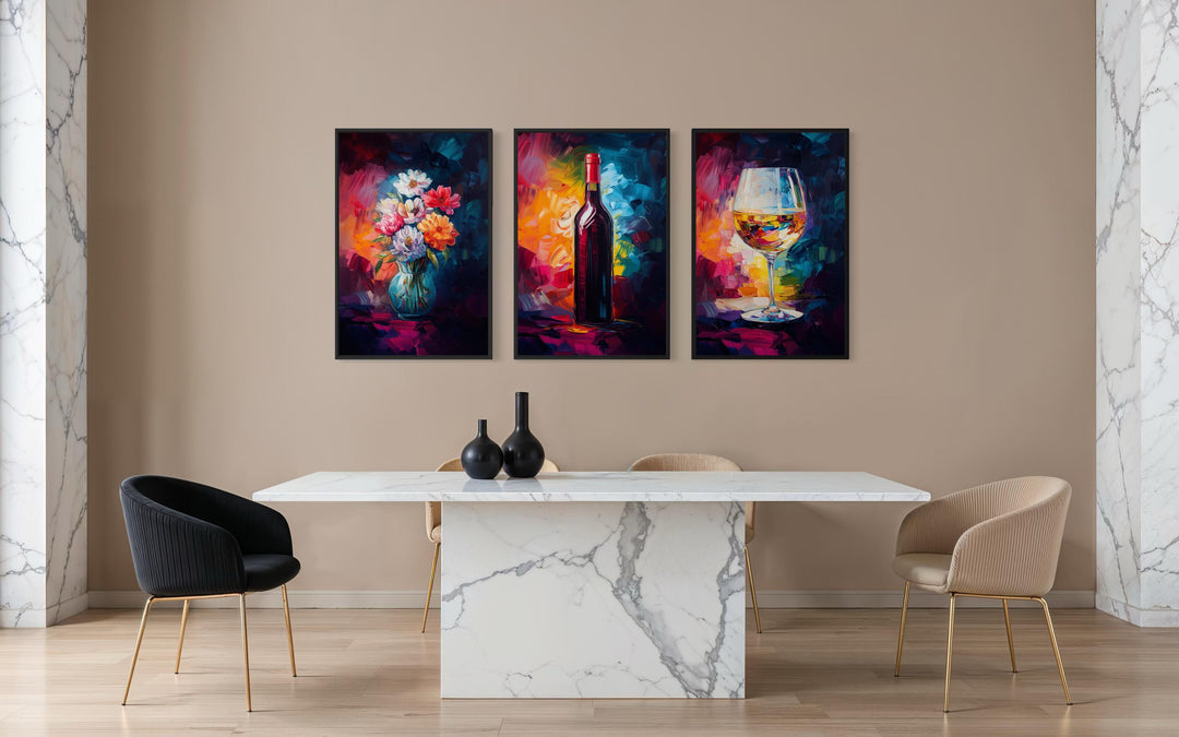 Set of three colorful canvas prints featuring a wine bottle, flower vase, and wine glass.