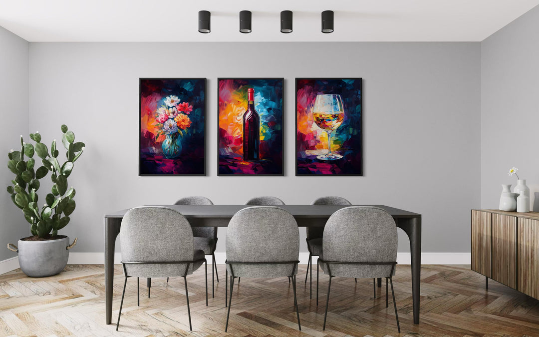 Set of three colorful canvas prints featuring a wine bottle, flower vase, and wine glass.