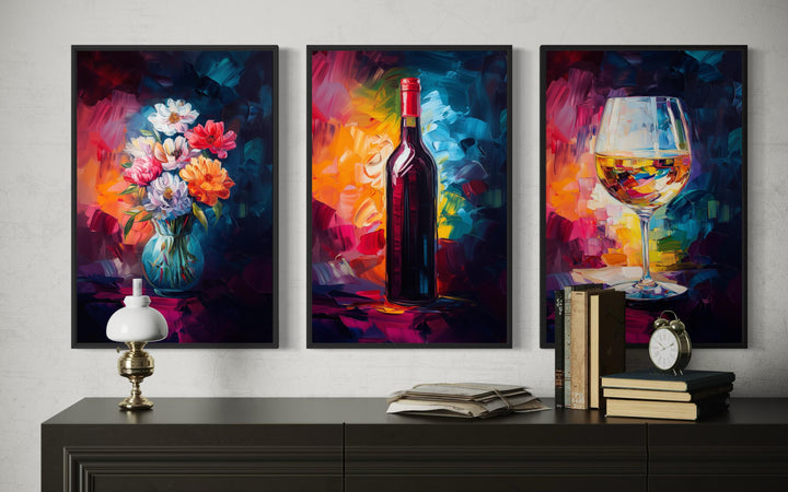 Set of three colorful canvas prints featuring a wine bottle, flower vase, and wine glass.