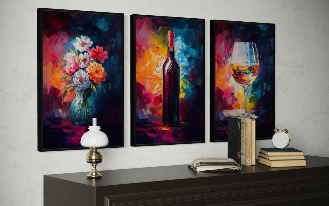 Set of three colorful canvas prints featuring a wine bottle, flower vase, and wine glass.