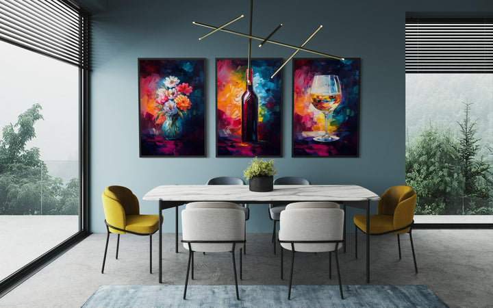 Set of three colorful canvas prints featuring a wine bottle, flower vase, and wine glass.