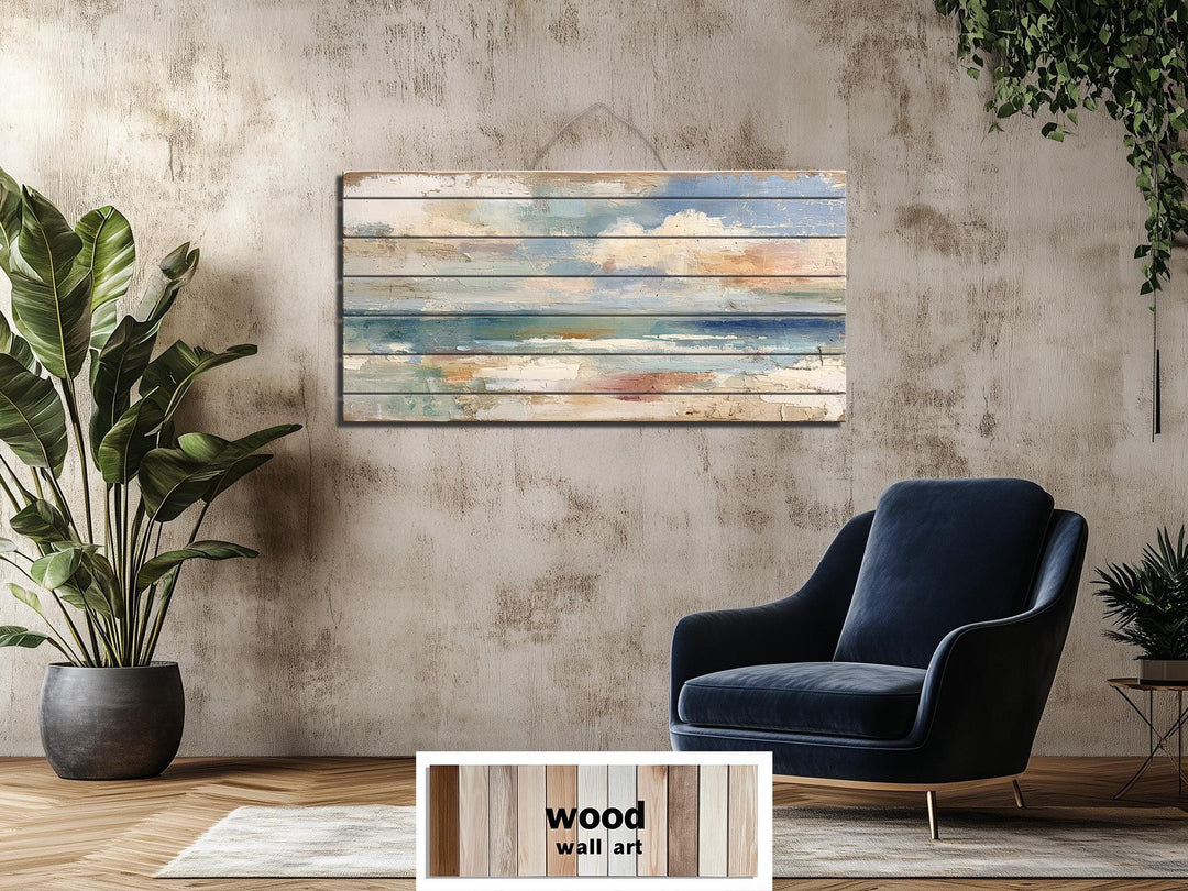 Distressed ocean horizon rustic wood wall art with soft blues and sandy tones.