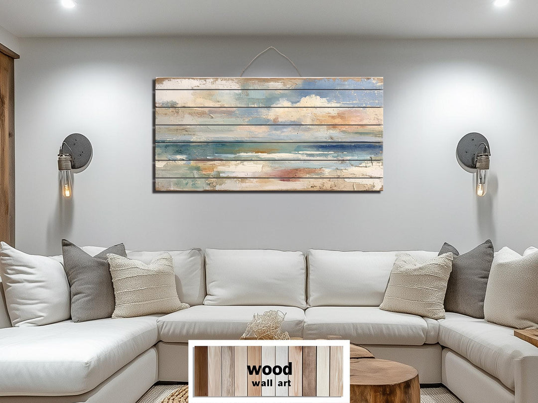 Distressed ocean horizon rustic wood wall art with soft blues and sandy tones.