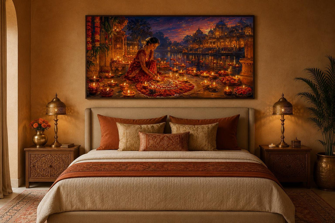Diwali canvas wall art of a woman lighting diyas above a bed with warm orange and gold tones.