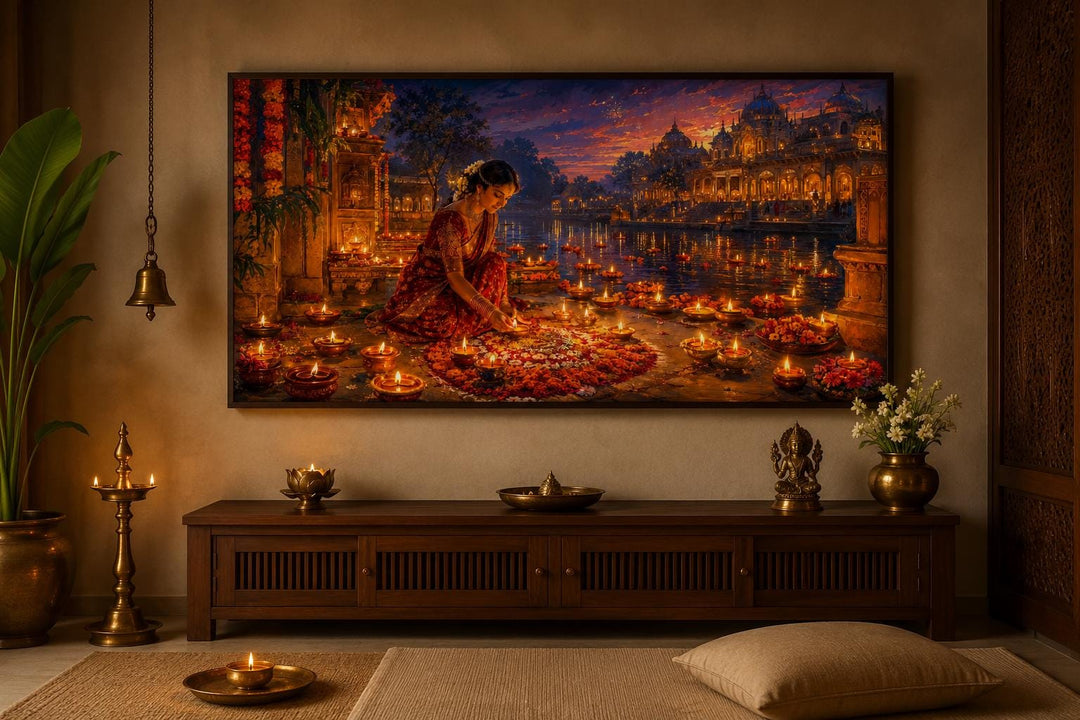 Diwali canvas wall art of a woman lighting diyas at a festive riverside, hung above a wooden console.