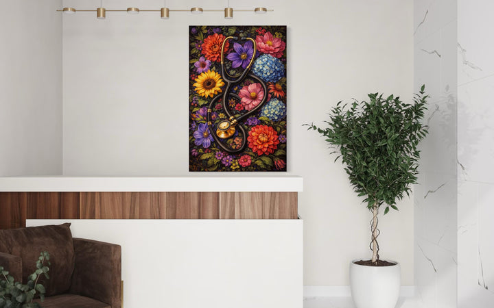 A floral stethoscope canvas print hangs on a white wall above a modern medical office reception desk.