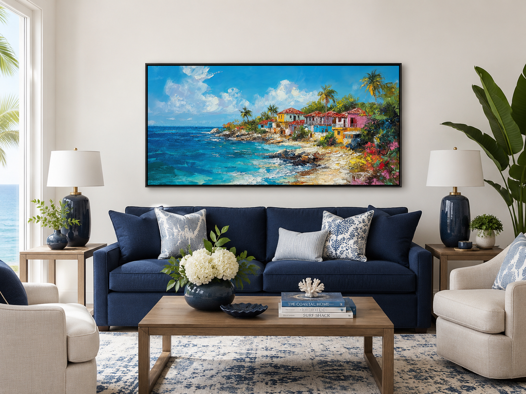 Dominican Republic beach painting canvas wall art above a blue sofa in a coastal living room.