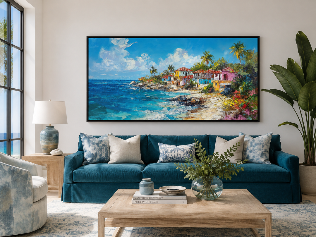 Dominican Republic beach painting canvas wall art above a blue sofa in a coastal living room.