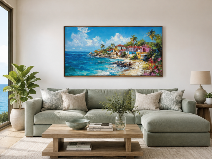 Dominican Republic beach canvas wall art featuring a colorful coastal village above a green sofa.