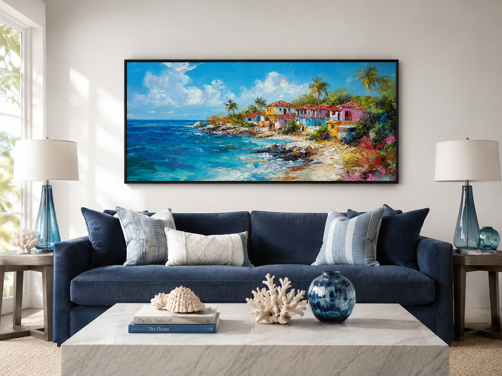 Dominican Republic beach painting canvas wall art above a blue sofa in a coastal living room.