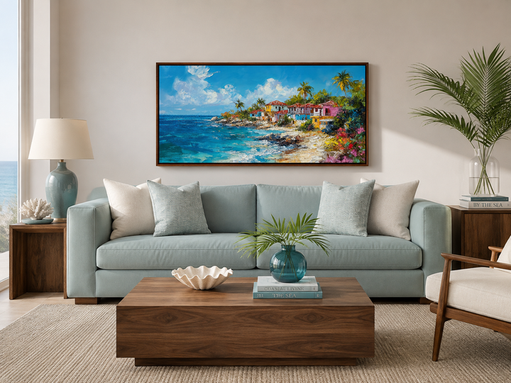Dominican Republic beach painting canvas wall art above a light blue sofa in a coastal living room.