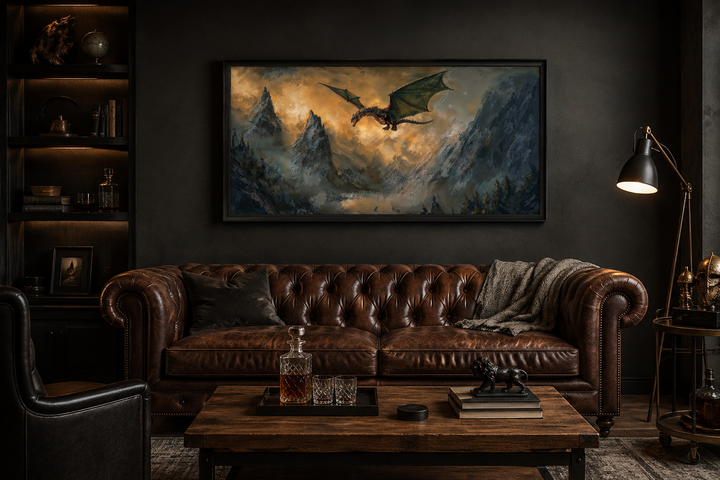 Framed panoramic canvas art of a green dragon flying over misty mountains above a leather sofa.