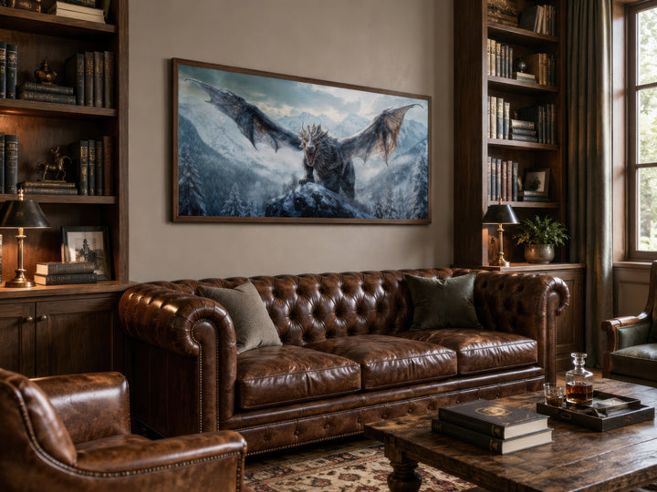 Framed dragon canvas wall art above a leather sofa in a rustic study or game room.