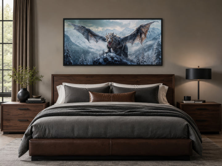 Framed dragon canvas wall art above a bed in a modern bedroom with snowy mountain scenery.