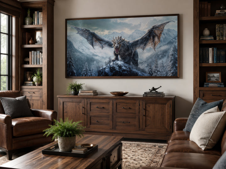 Framed dragon canvas wall art depicting a dragon in snowy mountains above a wooden sideboard.