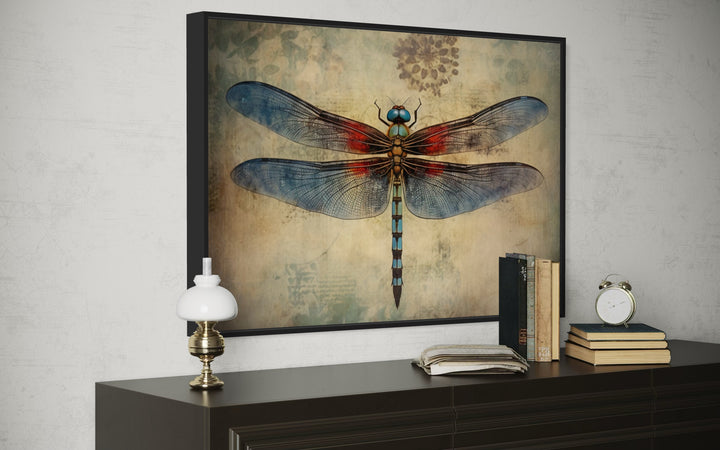 Dragonfly Vintage Rustic Framed Canvas Wall Art hanging above a dark wood dresser with decor.