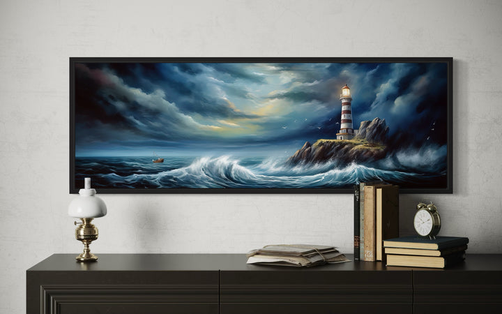 Panoramic wall art of a lighthouse on a rocky cliff amidst a stormy ocean with crashing waves.