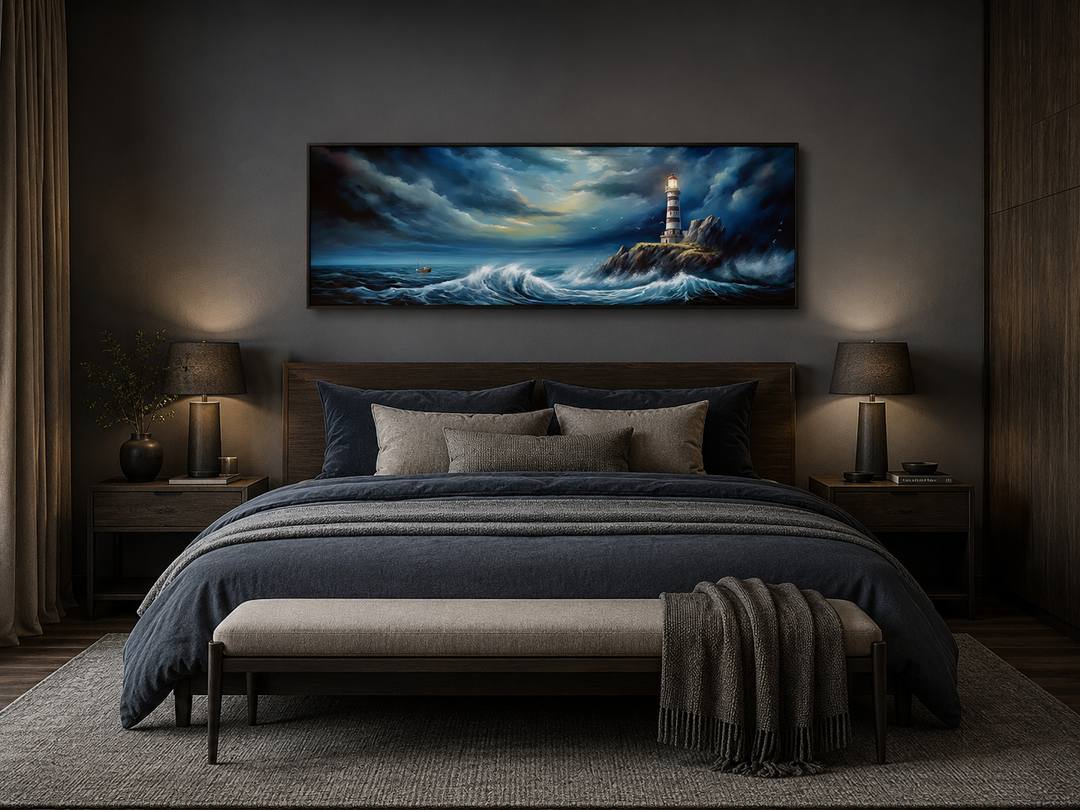 Dramatic lighthouse in stormy ocean long horizontal wall art hanging above a bed in a dark bedroom.