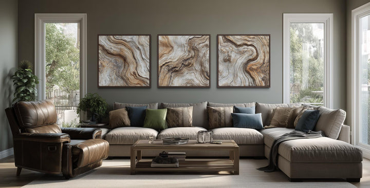 Triptych of three square canvas prints featuring abstract driftwood grain in warm, natural tones.