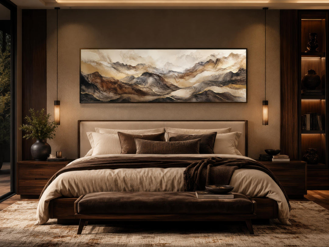 Long horizontal canvas featuring earthy abstract mountain art in brown and gold tones above a bed.