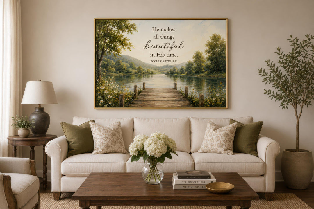 Ecclesiastes 3:11 scripture wall art above a sofa in a warm, rustic living room.