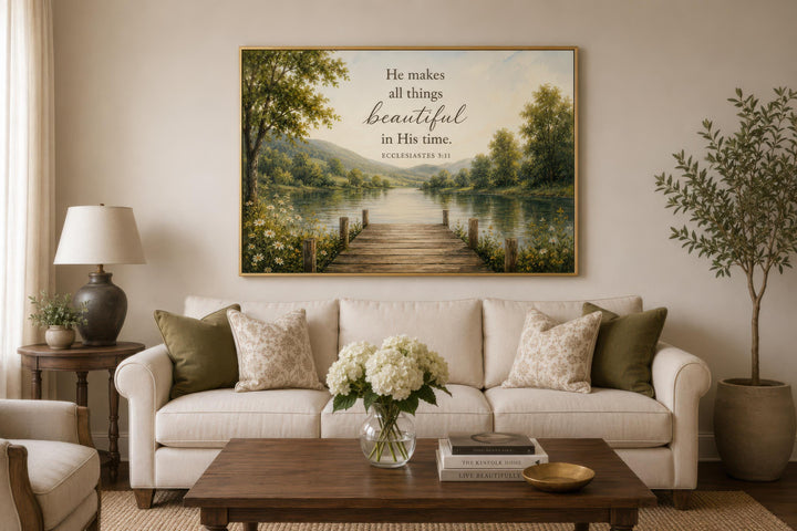 Ecclesiastes 3:11 scripture wall art above a sofa in a warm, rustic living room.