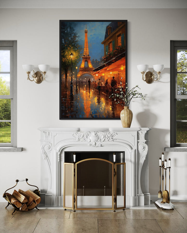 Eiffel Tower and Paris street cafe framed canvas wall art hanging above a white fireplace mantel.