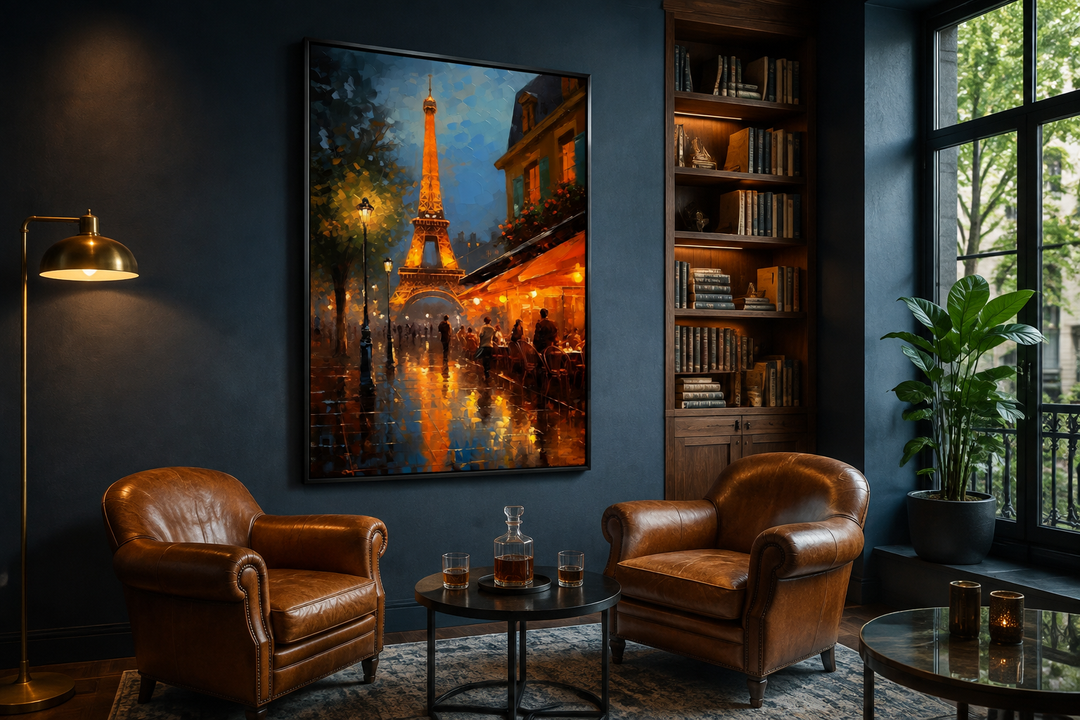 Framed canvas wall art of the Eiffel Tower and a Paris street cafe in a dark blue living room.